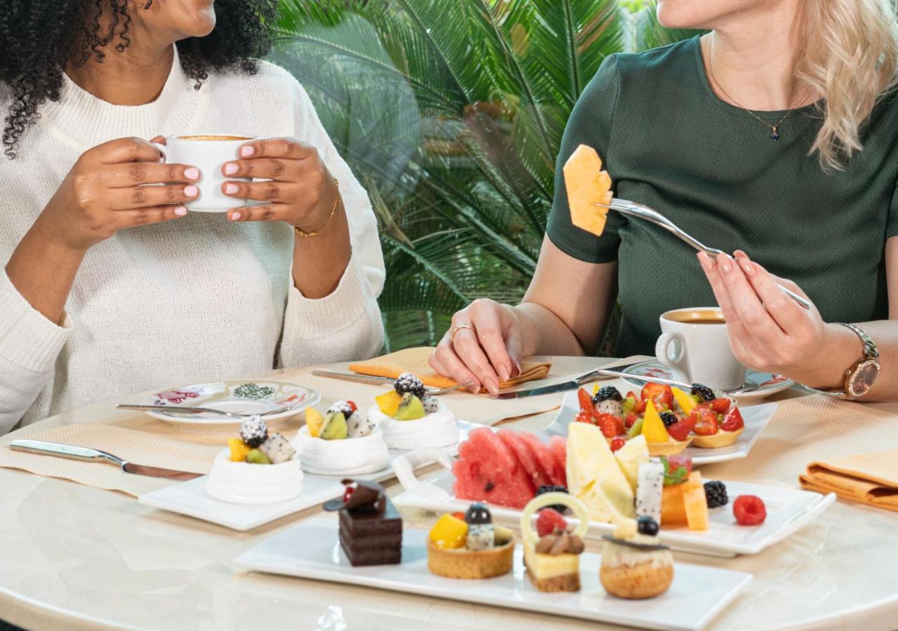 City Centre Rotana Doha Exterior photo A typical afternoon tea