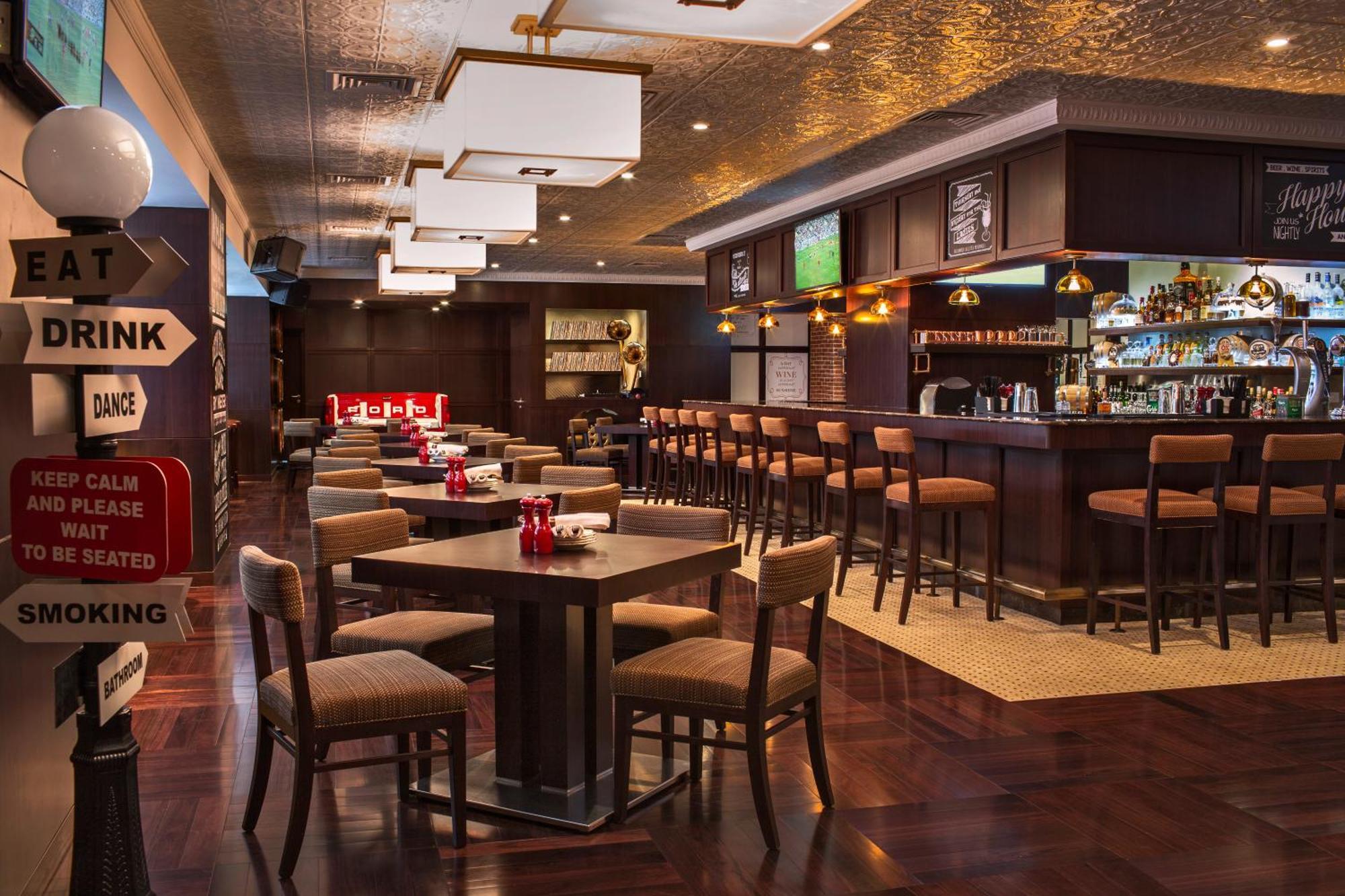 City Centre Rotana Doha Exterior photo The interior of a typical bar