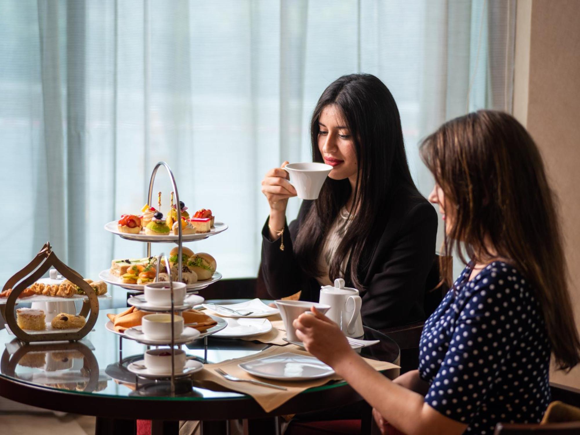 City Centre Rotana Doha Exterior photo Afternoon tea
