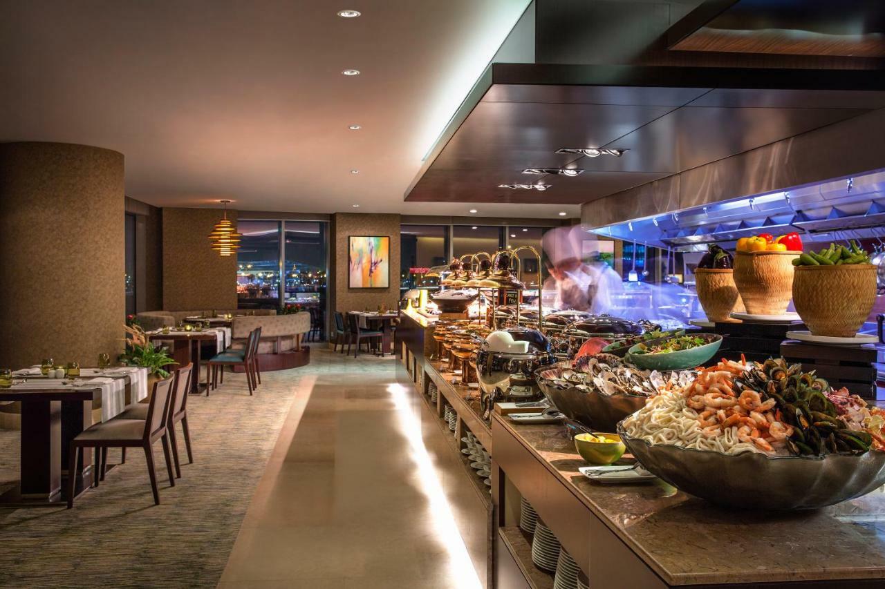 City Centre Rotana Doha Exterior photo The buffet at the restaurant